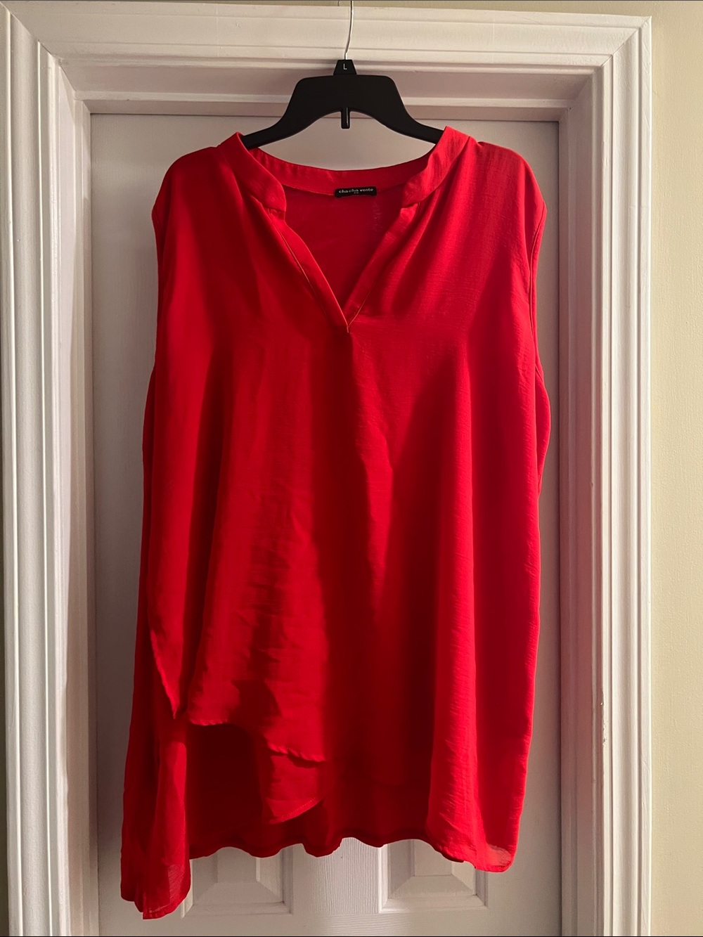 Cha cha vente  Sleeveless V-Neck Blouse